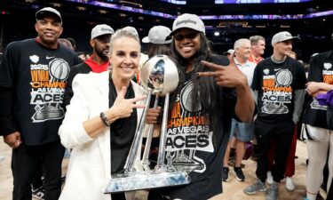 Becky Hammon working with San Antonio Spurs players in April 2022.