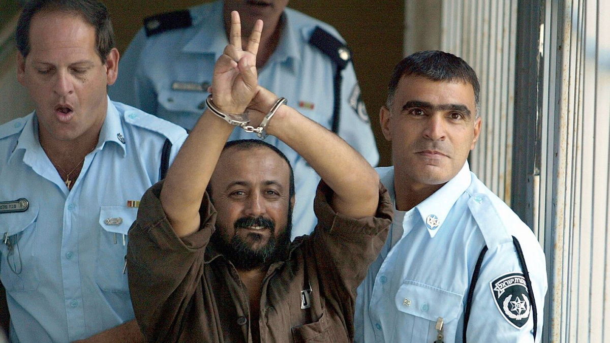 <i>Uriel Sinai/Getty Images via CNN Newsource</i><br/>Palestinian leader Marwan Barghouti is taken away under escort on September 29