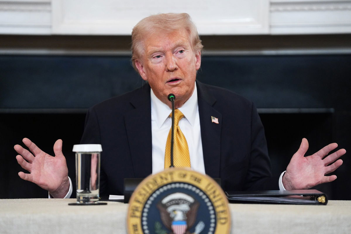 <i>Evan Vucci/AP via CNN Newsource</i><br/>President Donald Trump answers questions from reporters during a roundtable on criminal cartels in the State Dining Room of the White House