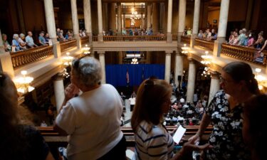 Demonstrators rally against redistricting at the Indiana Statehouse in Indianapolis on September 18.
