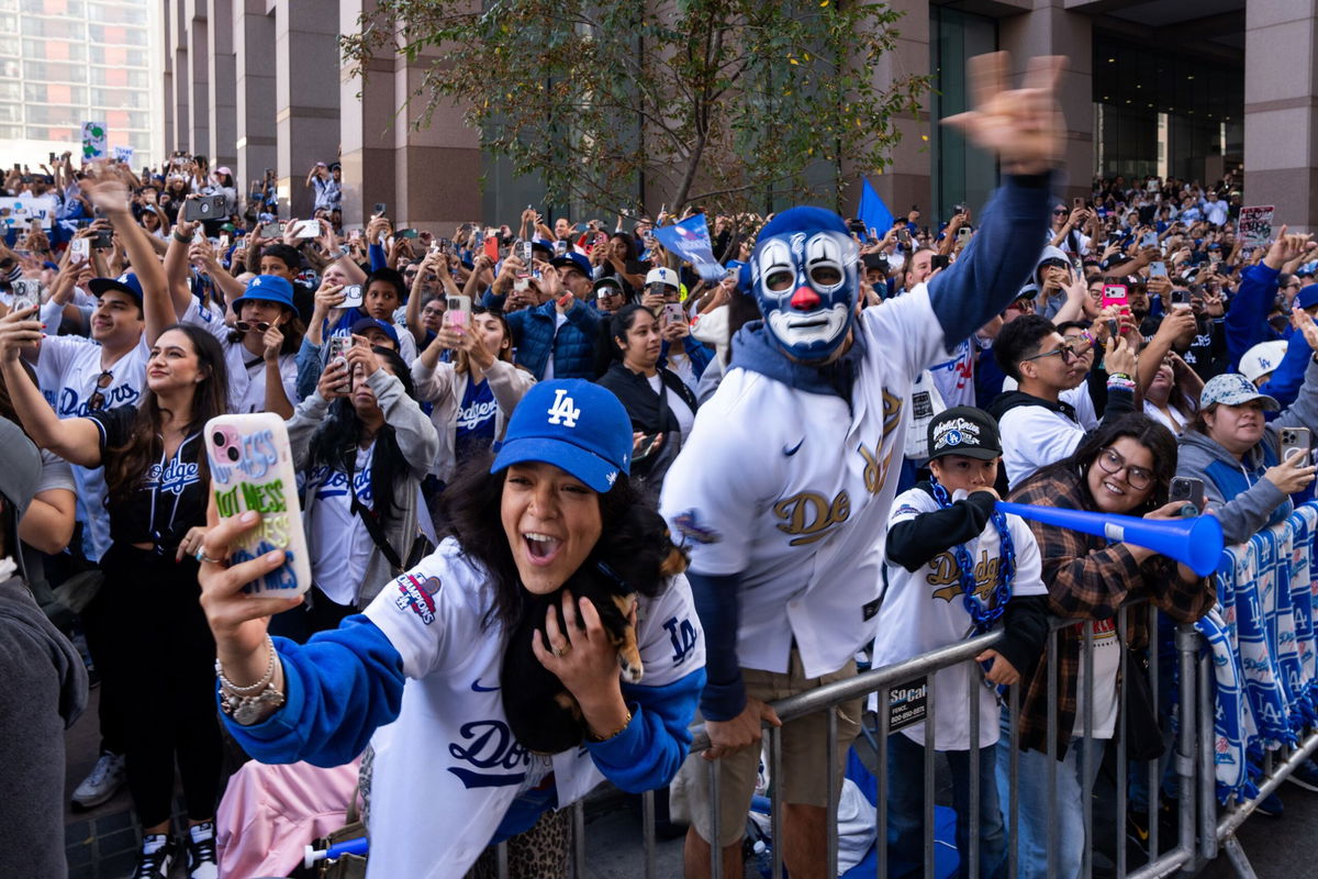 Fans cheer along the route during the Los Angeles Dodgers' World Series championship parade on Monday.